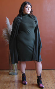Plus size model in long cardigan and matching turtleneck dress